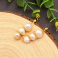 Baroque pearl drop earrings with golden spiral wire wrap on natural wood base - Caterpillar Style Earrings