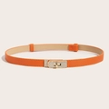 Close-up of orange Saffiano leather skinny belt with crystal-studded gold turn-lock buckle - Rhinestone Buckle (Gold) Cross Pattern Adjustable Belt (Orange)