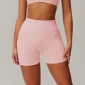 Nahtlose High-Waist Yoga-Shorts in Hellrosa mit körperformendem Peach-Butt-Lift-Effekt - S / Bottoms / Pfirsichrosa