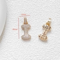Macro view of a 30mm gold letter I pendant with zircons and hollow-out back design - Letter I