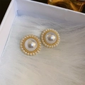 Close-up of vintage flower earrings with central white pearl and gold setting - Vintage Sunflower Pearl Studs (24# Silver Post)