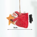 Babbo Natale retrò in resina con stella gialla e corda di iuta naturale, 9cm - Babbo Natale Orizzontale con Stella