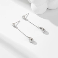 Boucles d'oreilles longues en argent avec zircons et pendentifs en forme de goutte - Argenté