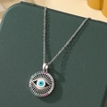 Silver Evil Eye necklace with multi-colored crystals and a central blue eye motif - Sunburst Evil Eye / A1-Silver