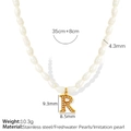 Elegant gold titanium steel necklace with white pearls and letter R pendant detail - Letter R Gold-Tone Necklace with Artificial Pearl