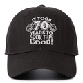 Detailed close-up of white embroidery on a black 70th birthday cotton baseball cap - Dark Gray