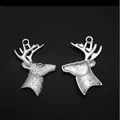 Pair of silver vintage reindeer head metal pendants with detailed antler carvings - Deer Head / Antique Silver