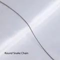 Close-up of polished silver round snake chain necklace with dense flexible texture - Round Snake Chain 40+5cm-Steel Color
