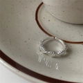 Silver adjustable shell ring with a sleek fan-shaped design on a ceramic plate - Silver Shell Fan Shape Open Ring (J4002)