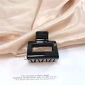 Sleek black square hollow hair claw clip for women on a soft silk background - Black Small Square Claw Clip