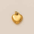 Close-up of a polished 18K gold plated heart pendant with a smooth metallic finish - Heart Pendant