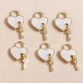 Gold heart lock and key charms set with white enamel and sparkling rhinestones for DIY - White