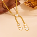 Three-layer gold snake chain necklace with white mother-of-pearl heart tassels - Gold