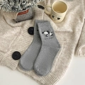 Grijze Fair Isle sokken met schattig geborduurd hondje en de tekst Love Puppy - Eén maat / Grijze Hond