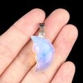 Face carved moon pendant in translucent opal blue finish with silver bail - Opal (Synthetic)