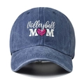 Close-up of Volleyball MOM embroidery and pink heart on washed denim baseball cap - One Size / Navy Blue