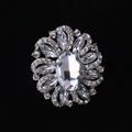 Floral crystal brooch with silver finish featuring an oval centerpiece and marquise stones - MM-BR-0029 / Silver