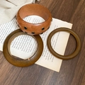Detail of retro wooden texture bangles set with metal studs on vintage paper - #3 Bracelet - Brown - Three-piece Set