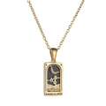 Macro shot of Knight of Cups tarot necklace featuring black enamel and sparkling zircons - Knight of Cups / Gold