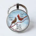 Memorial glass pendant keychain featuring red cardinals and sentimental family message - Cardinals/Memorial Mom Dad