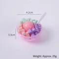 Miniature pink ice cream bowl model with colorful jelly cubes and a small white spoon - Pink Ice Cream Ball - Fruit Chunks Ice Bowl