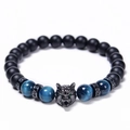 Detail of wolf head bracelet with blue tiger eye stones and matte black agate beads - Sky Blue Tiger Eye Style