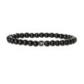 Macro detail of 6mm black polished stone beads with a hexagonal gray hematite accent - Glossy Black Stone