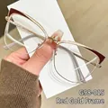 Cat-eye brilmontuur in rood en goudkleurig metaal met heldere glazen in vintage stijl - Rood Goud Montuur