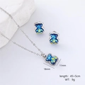 Detail view of resin bear jewelry set with dimensions 11x18mm and 45+5cm length necklace - Blue (Steel Color)