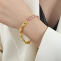 Gold twisted chain bracelet with pink and white beads worn on a female wrist - Natural Stone Bracelet (E497) / 18cm / Pink