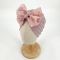 Newborn baby headband in dark pink ribbed fabric with a large gold-dot mesh bow - Dusky Pink