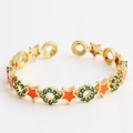 Adjustable gold bracelet with orange enamel stars and green zircon circles - Star Orange