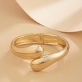 Detail view of the gold-plated irregular teardrop bracelet with a sleek hinged design - Double Artificial Pearl Open Cuff (03 Gold 2427)