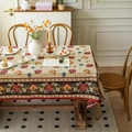 Nappe de Noël jacquard vintage avec motifs de poinsettias et cloches sur une table en bois - 60*60cm / Fleur de Noël Teinte en Fil