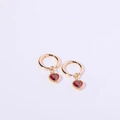 Elegant gold earrings featuring vibrant red heart-shaped gemstone charms for women - January / Garnet Red