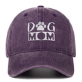 Close-up of DOG MOM white embroidery and paw print on vintage washed purple cotton baseball cap - Purple