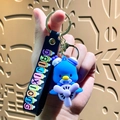 Blue penguin cartoon character keychain with propeller base and colorful letter strap - Sanrio Airplane-Tuxedo Sam