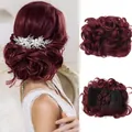 Close-up of wine red curly hair bun piece with comb clip and floral hair accessory - 99J (Burgundy)