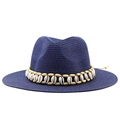 Close-up of a blue woven Fedora straw hat with white shells and wood bead decoration - Navy Blue