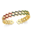 Golden open bangle featuring geometric links set with multi-colored square-cut zircons - Multi-color