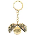 Detailed macro view of the gold sunflower locket keychain with an engraved message inside - T00008 Full Gold (You were given this life because you are strong enough)