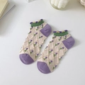 Beige ankle socks featuring purple floral patterns and green ruffled lace trim - One Size / Beige Multiple Flowers