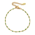 Close-up of gold-plated stainless steel bracelet with green beads and S.steel hallmark - Gold Emerald Green