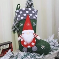 Green Christmas stocking with gnome doll and white snowflake embroidery decoration - Red Hat Gnome Green Stocking (F-W153)