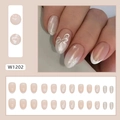Oval French press-on nails with white snowflake and 3D bow design in nude pink finish - W1202 Pure Lust Snowflake