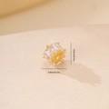 Macro detail of cubic zirconia stud earring in gold frame with size dimensions - Gold Cube Single Zirconia