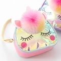 Detail of holographic unicorn crossbody bag with pink pompom and adjustable yellow strap - Colorful