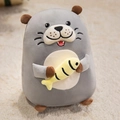 Cute gray otter plush toy holding a yellow fish, soft stuffed animal for children's comfort - Medium / Gray