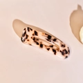 Macro detail of tortoiseshell acetate claw clip showing premium texture and spring - 1# Beige Acetate Long Barrette