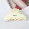 Creamy white PC hair claw clip featuring Barrette La France text for fine hair - Creamy White with Logo